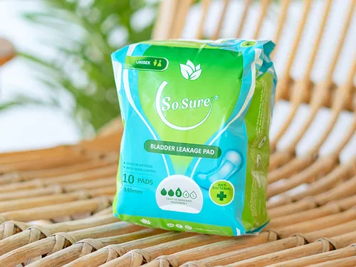 A So Sure 340mm bladder leakage pad pack rests on a woven rattan surface.